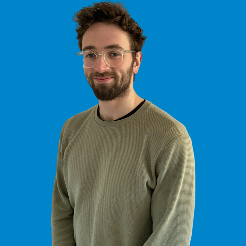 Gianluca Palombo headshot on blue background