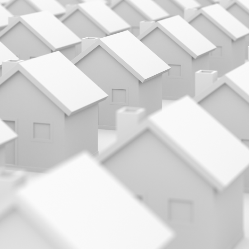 Rows of identical white houses